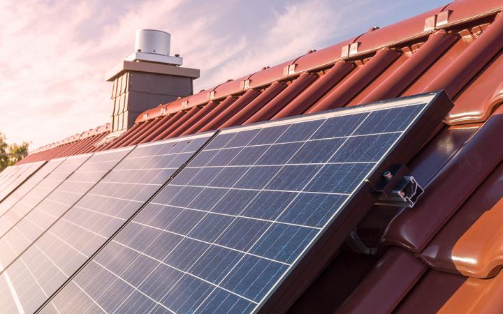 Solar panels on a roof in sunshine