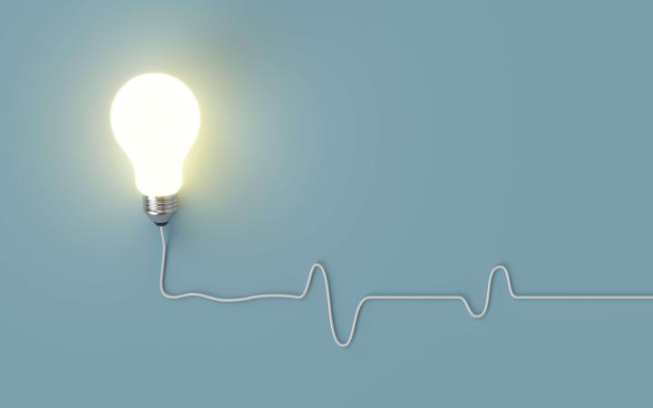 An image of a lightbulb against a blue background