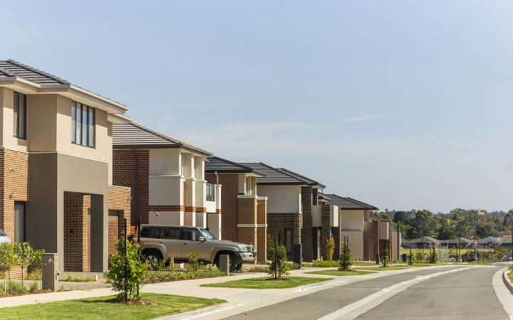 A row of houses on a suburban street