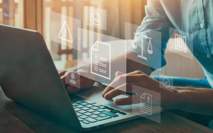 A photo of a person using a laptop