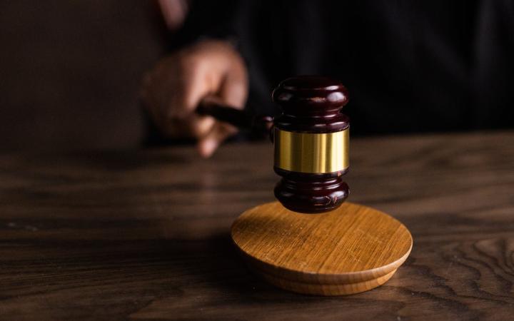 Brown Wooden Gavel on Brown Wooden Table