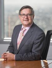 Commissioner Simon Corden