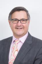 Commissioner Simon Corden