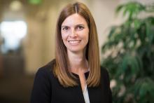 A profile of commissioner Kate Symons.